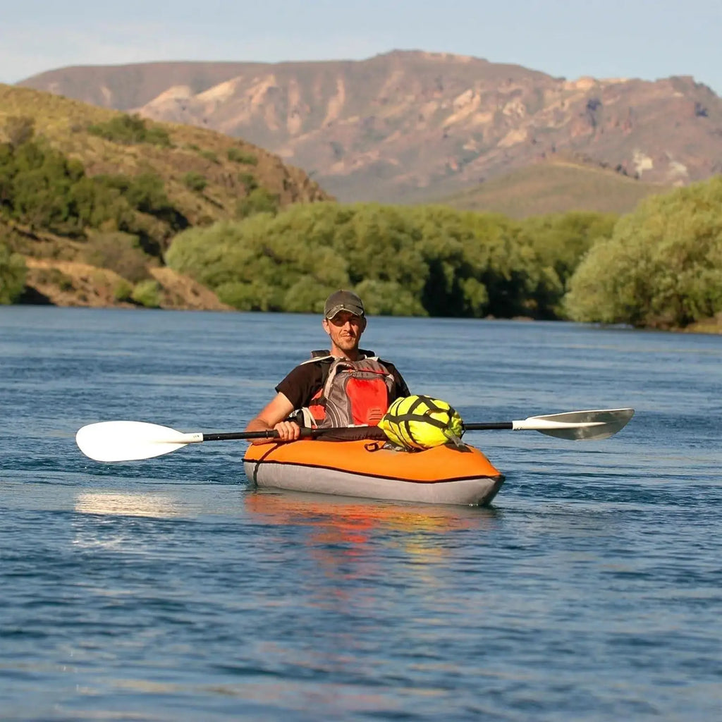 Rubber molded handle | Bungee deck lacing | Inflatable Coaming for Spray Skirt | Paddle holder | Mesh pocket | Spring Valve